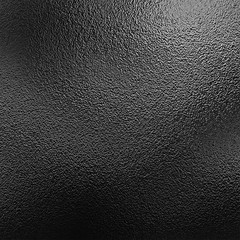 Background texture of shiny black metal foil