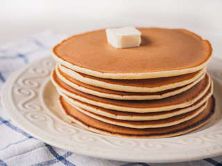 Pancakes with butter on the plate