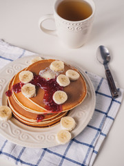 Pancakes with butter and jam