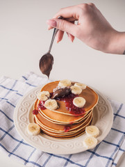 Pancakes with butter and jam