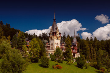 Wide angle postcard view of the Peles Castle in Sinaia, Romania