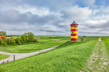 The Pilsum lighthouse on the North Sea coast of Germany.