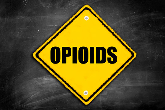 Opioids Written On Caution Sign