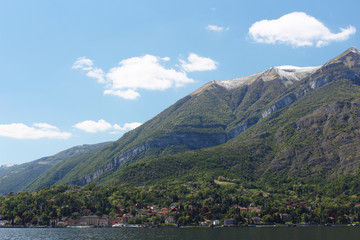 Beautiful little village on the shore of the Como lake near the mountain