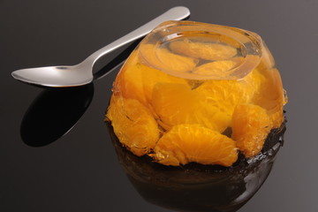 Jelly tangerine on a black background