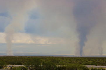 Smoke and clouds from multiple wildfires in New Mexico, USA