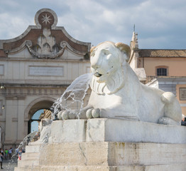 Lion fountain in Piazza del Popolo in Rome, Italy