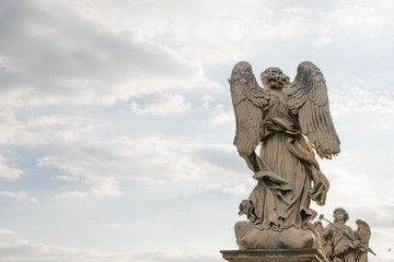 Obraz premium Bernini's marble statue of angel from the Sant'Angelo Bridge in Rome, Italy