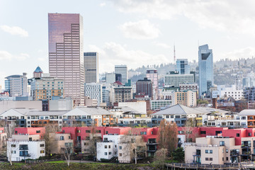 Cityscape of downtown Portland during overcast weather with condominiums