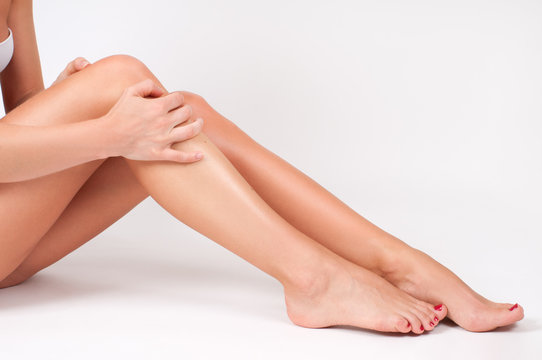 Hair removal and epilation. Woman legs with smooth skin after depilation.