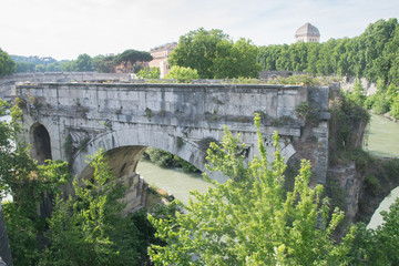 Fototapeta na wymiar Ancient Roman bridge in Rome