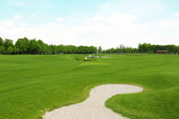 Obraz premium Landscape with big golf course on summer day