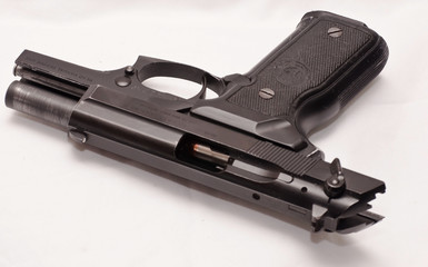 A black semi automatic pistol with the slide locked open