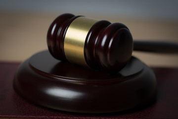 Close up of judge hummer on wooden background.