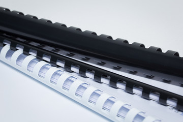 Plastic binding with leaves