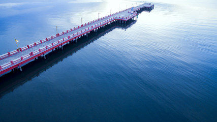 Naklejka na ściany i meble beautiful harbor bridge and blue plain sea in morning light
