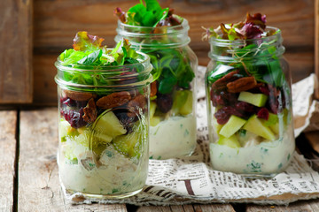 chicken, apple and pecan salad in a jar.style rustic.