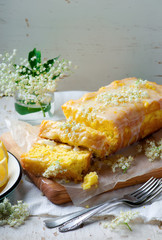 LEMON  and ELDERFLOWER DRIZZLE CAKE.
