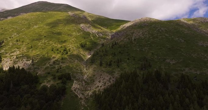 Aerial, green mountains in summer in Italy, 4K