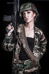 Fototapeta premium Woman Holding Gun