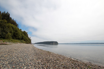 Shine Tidelands State Park shoreline of Bywater Bay near Port Ludlow in the Puget Sound in the...