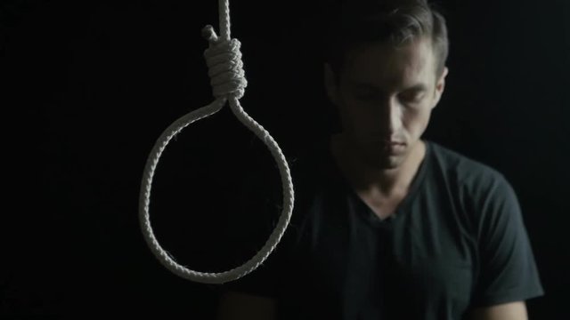 depressed man wants suicide using gallows noose