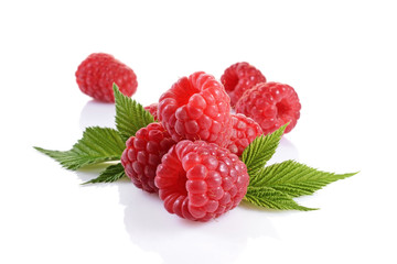 Healthy food. Close up view fresh ripe raspberry with leaves