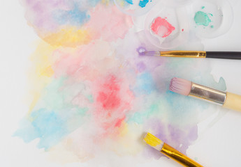 Fototapeta premium Brush painted pastel pink, yellow, green, purple, blue water colour bakground