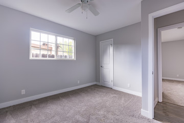 Empty bedroom in a model home in southern California