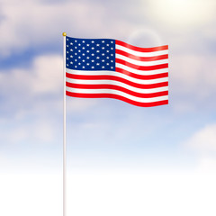 United States of America flag on blue sky background