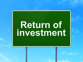 Business concept: Return of Investment on road sign background