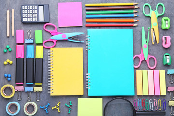 School supplies on grey wooden table