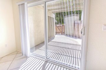 Doors to the house and a view of both inside and outside