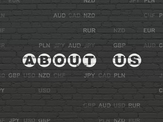 Business concept: About us on wall background