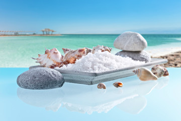 Obraz na płótnie Canvas Sea salt on a glass table