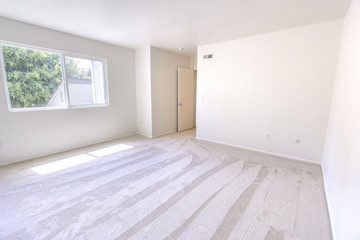 Empty bedroom in a model home in southern California