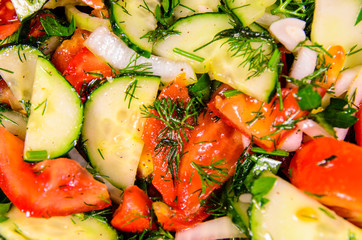 Background of salad with cucumbers and tomatoes