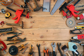 industrial tools on light wooden background with copy space. top view. tools texture. tools...