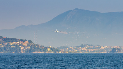 Fototapeta na wymiar Aircraft landing on the Greek island of Corfu, Europe.
