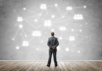 Obraz premium Linie połączeń narysowane na betonowej ścianie jako symbol sieci