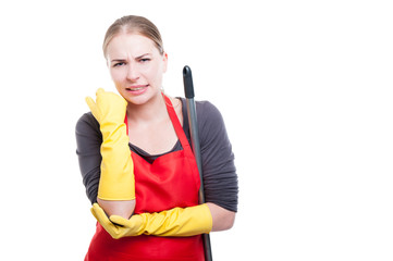 Housemaid in unifrom having elbow pain