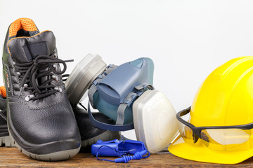 Safety equipment on wood background