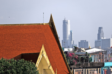 temple roof in the city on blue sky