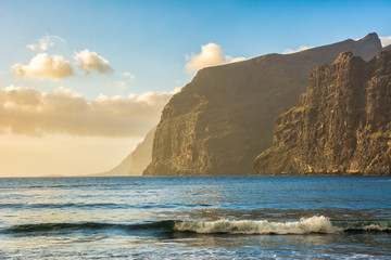 Amazing view from beach in Los Gigantes with high cliffs on the sunset. Location: Los Gigantes, Tenerife, Canary Islands. Artistic picture. Beauty world. © olenatur