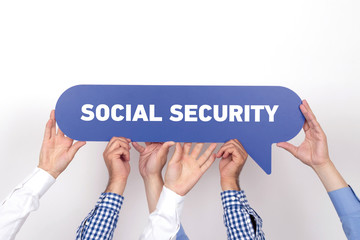 Group of people holding the SOCIAL SECURITY written speech bubble