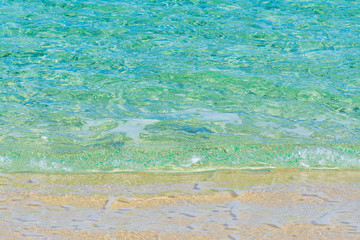 Close up of Cala Sinzias turquoise sea in Villasimius