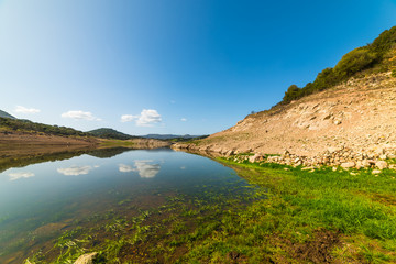 Reflection in Temo lake on a clear day