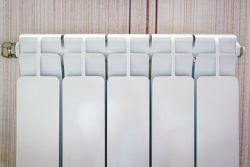 White radiator in an apartment.