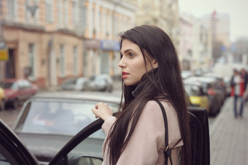 Girl gets into the car