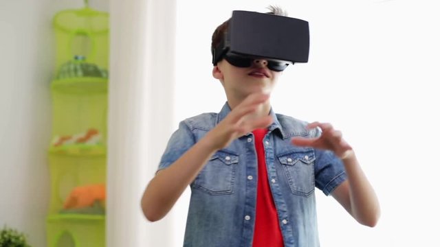boy in virtual reality headset or 3d glasses